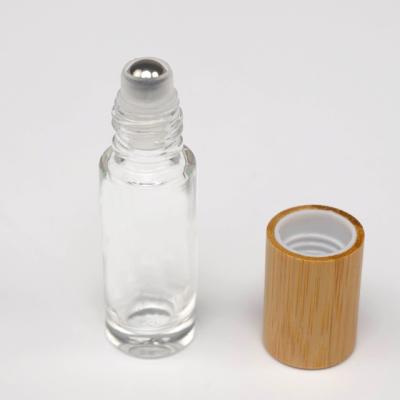 China Hot Sale 5ml 10ml 15ml Essential Oil Roll Bottle Cover Ball Glass Bottle Oil Roll Bamboo Bottle for sale