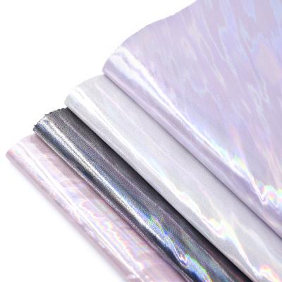 China Fashion Waterproof Fashion 3D Film Cool Colorful Glossy Luster Rexine Synthetic Leather Shoes Holographic Magic Materials for sale