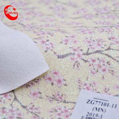 China High Quality Colored Artificial Wrinkle Resistant Plum Pattern Embellishment Shiny Glitter Fabric Leather For Decoration Wallpaper for sale