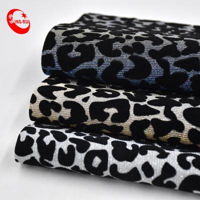 China Wrinkle Resistant Fashion Flocking Leopard Wallpaper Glitter PU Leather Fabric Wholesale For Bags Shoes Decorative Materials for sale