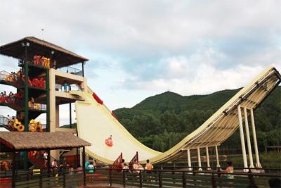 China 12m Plattformhöhe U - wogender Wasserpark Slide / kommerzielle Spielplatzgeräte zu verkaufen