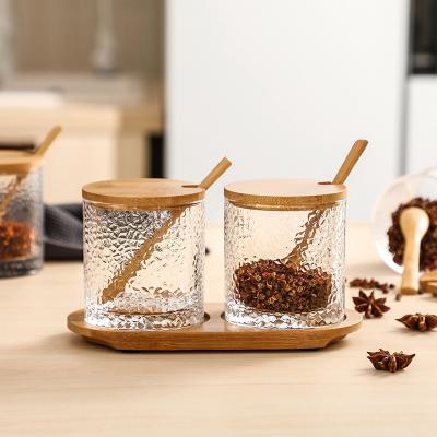 China AL Ins Style Condiment Container Box 3pcs Microwavable Seasoning Spice Glass Embossed Jars Set With Bamboo Lid And Spoon Base for sale