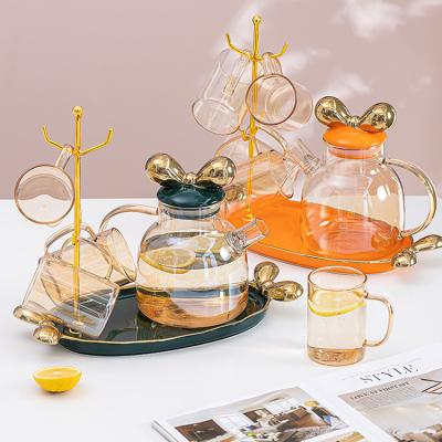 China AL Ins Style Home Use Stocked Coffee Drinking Set Jug Gold Glass Cup Kettle Tea Water With Ceramic Handle Tray for sale