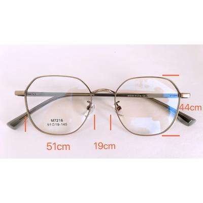 China Optical Glasses Round Shapes Titanium Eyeglasses Frame Women Men Optical Glass Frames for sale