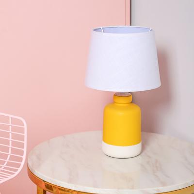 China Lighting Functions China Direct Selling Yellow Matte Office Hotel Indoor Lighting Ceramic Lamp With Canvas Lampshade for sale