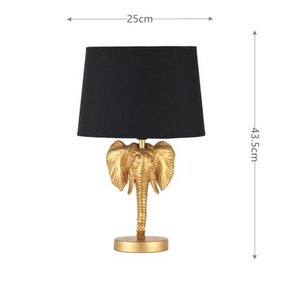 China Lighting Works Luxury Bulk Bedside Hotel Gold Elephant Table Lamp Cheap Single Reading Lamp for sale