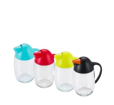 China Comfortable handle; Uniform filter hole; Easy To Use Automatic Lid Oil Jug Penguin Oil Jug Large Capacity Opening Kitchen Oil Mixing Jar for sale