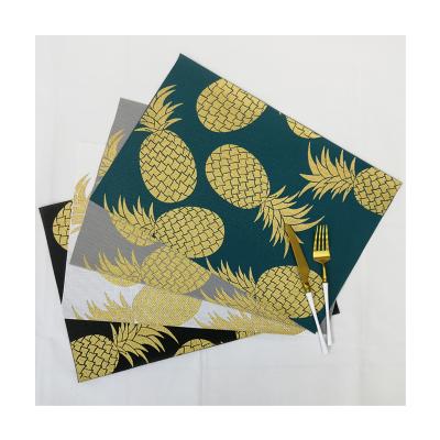 China Amazon Viable Top Selling Pineapple Design Gold Print Place Mat PVC Teslin Washable Place Mat With Coaster Woven Place Mat for sale