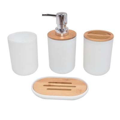 China Sustainable Hot Selling High Quality Bamboo 4-in-1 Bathroom Accessories Set Bottle Top Plastic Body Bathroom Vanity Set For Bathroom for sale