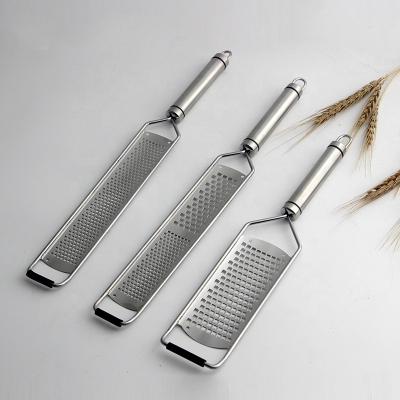 China Viable Hot Selling Amazon Kitchen Instruments Cheese Grater Cooking Tools Stainless Steel Lemon Zester Butter Vegetable Grater for sale