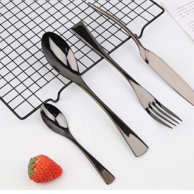 China Luxury high quality titanium stocked elegant black color stainless steel cutlery set to wedding hotel for sale