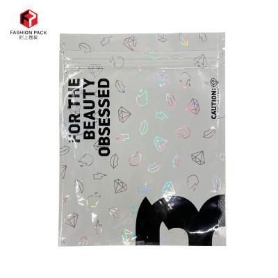 China Shinny Glossy Digital Moisture Proof Print Holographic Clear Cosmetic Pouch Three Ziplock Side Seal Packaging Bags for sale