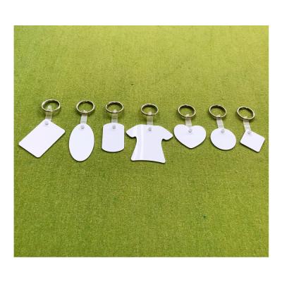 China Promotion Gift DIY Printable Sublimation Aluminum Metal Keychains Blanks T-shirt Shape With Plastic Tag for sale