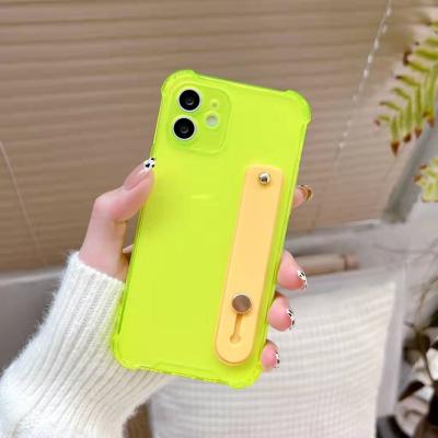 China Hot Selling Clear Shockproof Precision Protective Portable Hole Phone Case With Wrist Band For iphone 12 for sale