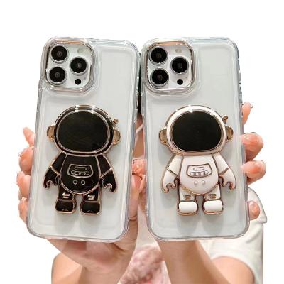 China Cute Astronaut 3D Folding Stand Shockproof Plated Phone Case For All IP Bracket Plating Phone Soft Bag Printing Bumper Cover for sale