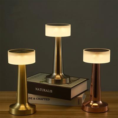 China Portable Creative Touch Vintage Gold Night Lamps Modern Wireless Charging Luxury Battery Restaurant Table Lamp for sale