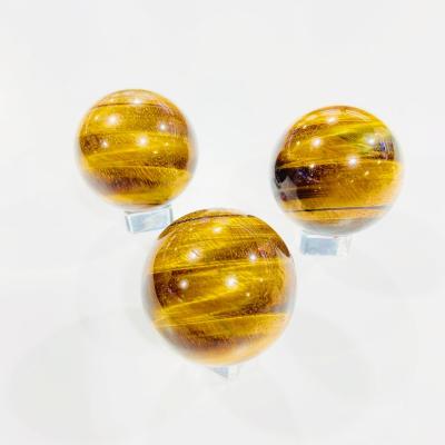 China China Crystal Craft Decorative Ball Home Dark Yellow Tiger Eye Ball Decorative Items for sale