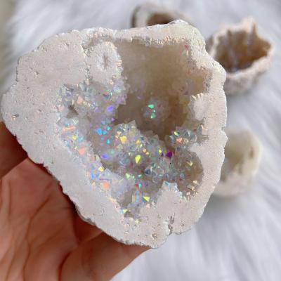 China Wholesale Natural High Quality Clean Agate Aura Geode Donghai Bulk Group Crystal Healing for sale