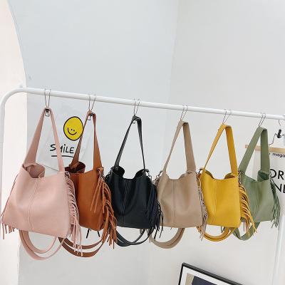 China 2022 summer new style spring tassel little girl western zero wallet/girls cross-body bag PU for sale