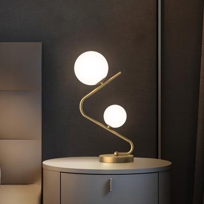 China Modern Minimalist Luxury Restaurant Glass Ball Desk Lamp Modern Chandelier Bedside Cups LED Gold Table Lamp for sale