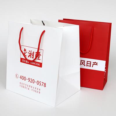 China Wholesale Recyclable Logo Printed White Cardboard Paper Shopping Bag With Handles for sale