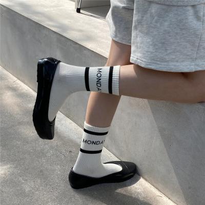 China QUICK DRY Custom Stripe Word Writing Socks For Women Wholesale Loose Cotton Cheap White Premium Socks for sale