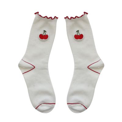 China QUICK DRY Women's Loose Black White Cute Peach Tube Orange Fruit Embroidered Funny Socks Machine Making Custom Embroidery Socks for sale