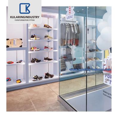 China Customized Design Clothes Shop Garment Store Furniture Boutique Glod Fit Clothing Display Rack For Clothing Store for sale