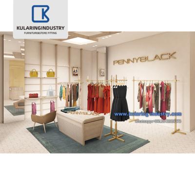 China Customized design retail fashion clothing store equipment clothing store display fixtures for ladies cloth showcase for sale