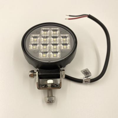 China ECONOMIC 12W LED WORK LIGHT FACTORY PRICE CAR LIGHT IP68 WATERPROOF 900LM 900LM AROUND WORK LIGHT for sale