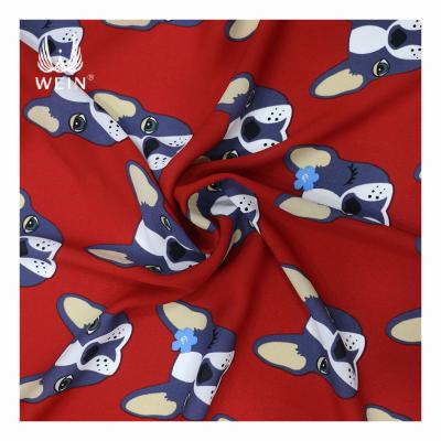 China Latest Design WI-B08 Hot Tear-resistant Color Cute Dog Moss Crepe Fabric For Garment for sale