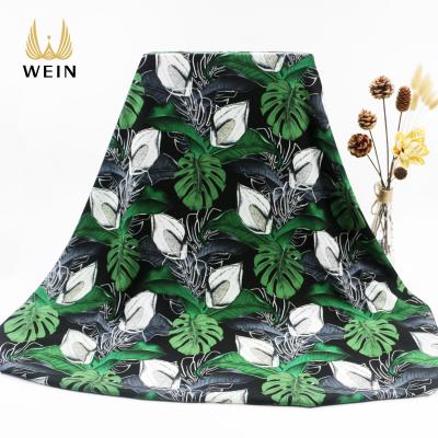 China WI-B12 Anti Static Selling 5050 Yarn Good Peach Fabric Tropical Hawaiian Banana Leaf Print For Shirts for sale