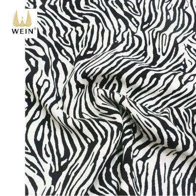 China Wrinkle Resistant Soft Viscous Rayon WI-VR01-98635 Crepe Fabric In Running Zebra-Stripe Printed Per Meter For Dress for sale