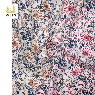 China New Arrival WI-A09-00173 Anti-Static Cut Free Fancy Color Bubble Chiffon Floral Printing Simple Textiles And Fabric For Dress Ruffled for sale