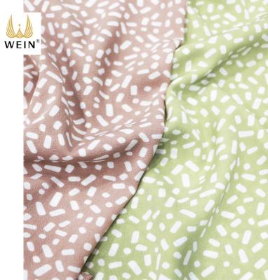 China WI-A09 comfortable polka dot anti-static special material printed tiger bubble chiffon for fashionable fabric for sale