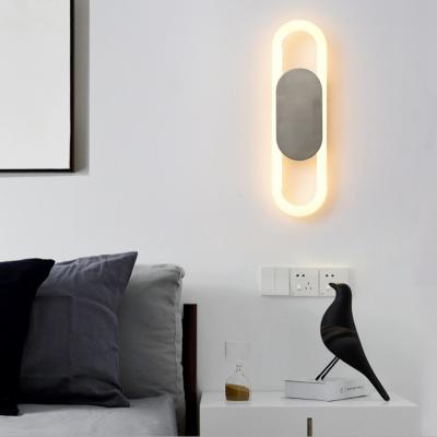 China Modern Nordic creative oval high light transmittance bedroom living room interior led wall lamp for sale