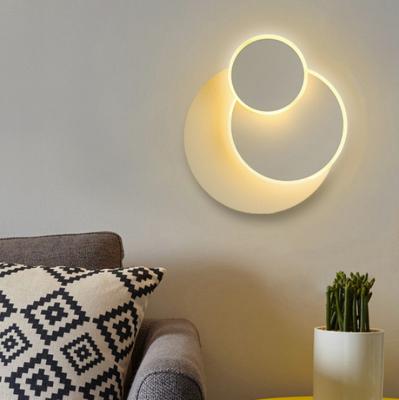 China Modern Nordic Creative Round Living Room Bedroom Indoor Lighting Rotatable Household Led Wall Lamp for sale