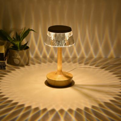 China Dining table modern creative bedroom adjustable touch touch shine projection crystal atmosphere led table lamp for sale