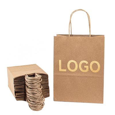 China Recycled materials personality printed brand food clothing kraft paper bag logo paper bags retail luxury custom printing shopping wholesale for sale