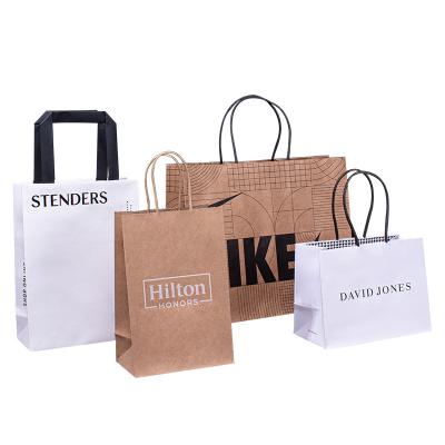 China Recycled Materials Wholesale Logo Printed Shopping Paper Bag Customized With Handle Brown And White Recycled Kraft Paper Bags With Your Own Logo for sale