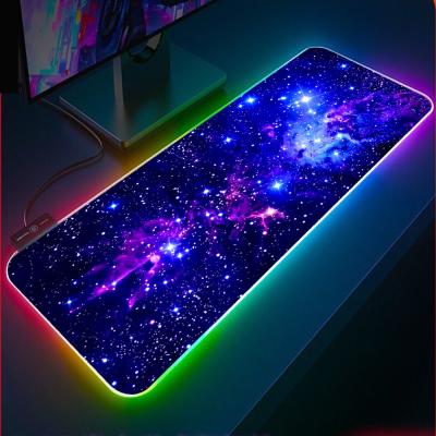 China Game Extended Large RGB Gaming Mouse Pad With Starry Sky Pattern Computer Mouse Mat Anti-Slip Base Optimized For Game Players for sale