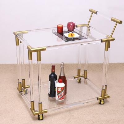 China Good Quality 2-Tiers Bar Cart Modern Gold Stainless Clear Acrylic Beauty Trolley Cosmetic Salon Trolley For Sale for sale