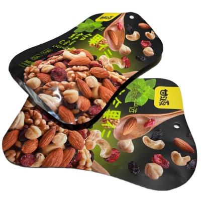 China Hot Selling Security Plastic Packaging Special Shaped Bag Nut Stand-up Bag for sale