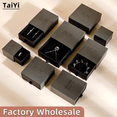 China Newest Fsahion New Style High Quality Slide Necklace Customized Luxury Paper Jewelry Boxes Ring Packaging Gift Soot Black With Logo Customized for sale