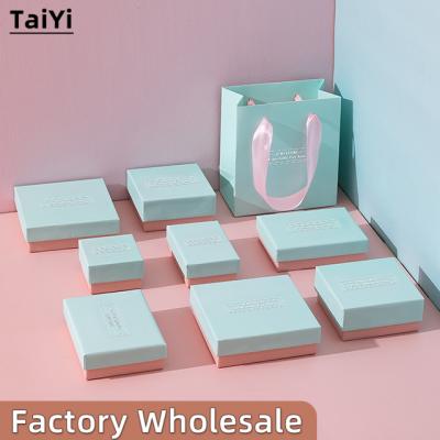 China Small Blue Rose Earring Ring Paper Packaging Jewelry Boxes Wholesale Custom Jewelry Boxes Gift Packaging Necklace Two Tone Recyclable for sale