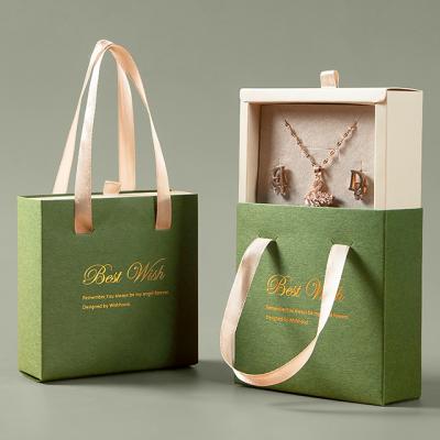 China Reused materials cutsom logo sliding drawers luxury paper jewelry box for necklace bracelet jewelry gift box for sale