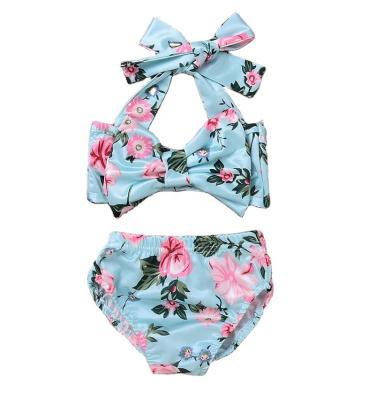 China 2021 New Quick-drying QUICK-DRYING high elasticity small fresh swimsuit solid color floral print split children's swimsuit for sale