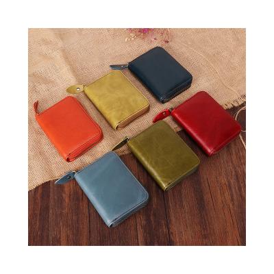 China Waterproof Flourish Large Capacity Leather Wallet Card Holder RFID Wallet Plain Wallet for sale