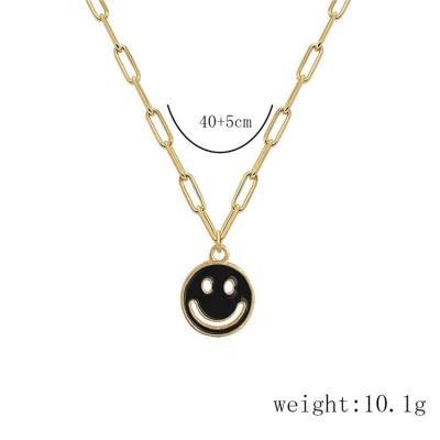 China Cute American Wholesale Fashionable Cavity Coin Jewelry PS Enamel Smile Face Charm Pendant Necklace for sale