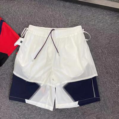 China 2022new arrival beach tourism men short pants designer patchwork QUICK DRY pants with drawstring summer convenient wearing casual trousers for sale